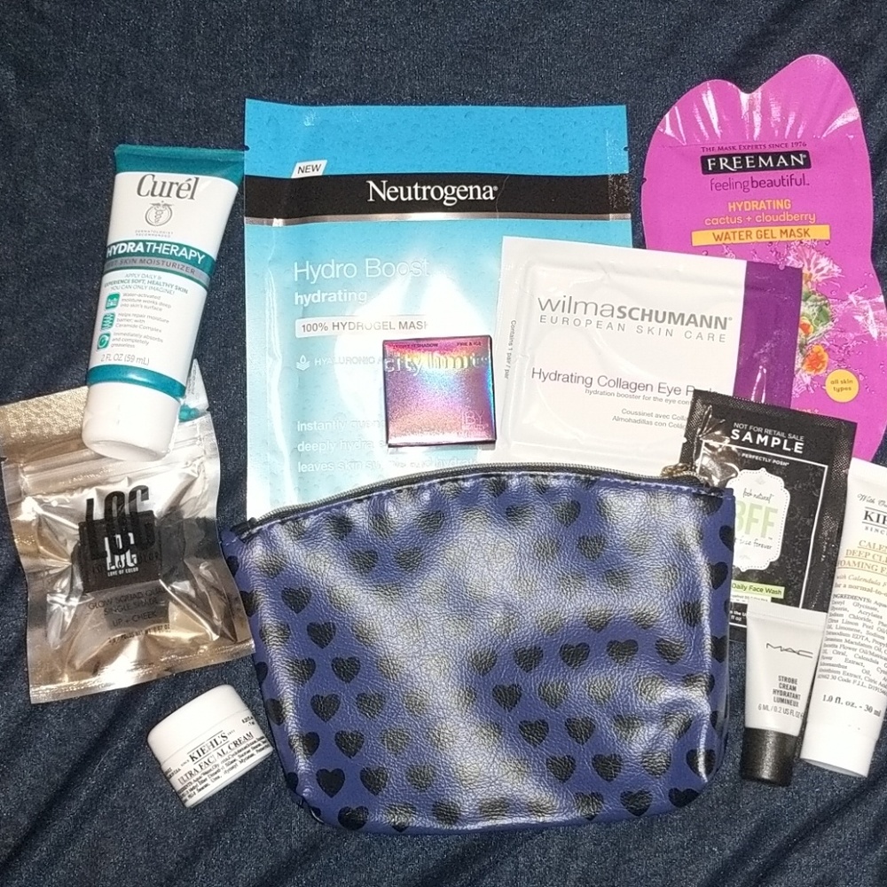 Ipsy bag w/ 10 beauty samples MAC, Curel